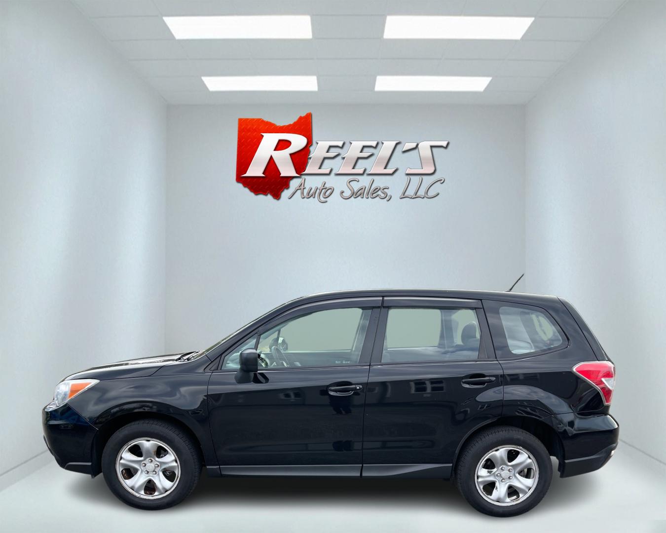 2015 Black /Black Subaru Forester 2.5i (JF2SJAAC1FH) with an 2.5L H4 SOHC 16V engine, Automatic transmission, located at 11115 Chardon Rd. , Chardon, OH, 44024, (440) 214-9705, 41.580246, -81.241943 - Photo#9